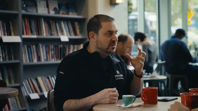 Dr Joseph Sakran, a trauma surgeon and himself a gunshot survivor, in a café in Baltimore.