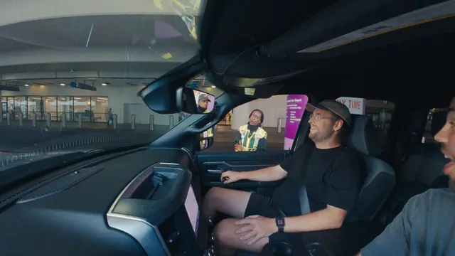 Josh and Tommy collect their oversized Ram pickup at the rental car depot at LAX, on their first day in America.