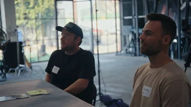 Josh and Tommy, name tags on, at Dutch Merrick's firearms safety course in Los Angeles.