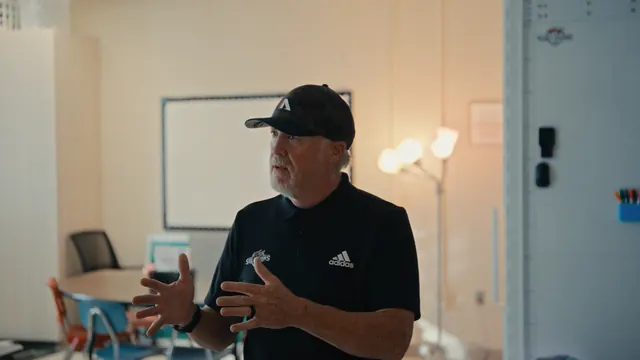 Kevin Thomas of KT Security Solutions in an Alabama classroom, explaining the bullet-resistant safe room he designed for schools.