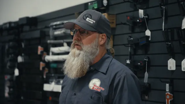 Shawn Wood of Rowdy’s Range in his gun shop in St George, Utah.