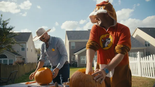 Tommy and Josh carve pumpkins for Halloween in Charlotte, North Carolina.